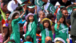 Young Pakistani children wave national flags as they watch the Pakistan Day military parade in Islamabad on March 23, 2016. Pakistan National Day commemorates the passing of the Lahore Resolution, when a separate nation for the Muslims of The British Indian Empire was demanded on March 23, 1940. / AFP PHOTO / AAMIR QURESHI