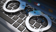 handcuffs-computer-cyber-keyboard-arrested