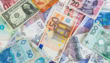 Different Currencies Banknotes Background