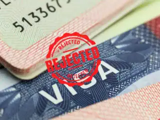 Us Cancels 100000 Visas Amid Immigration Crackdown