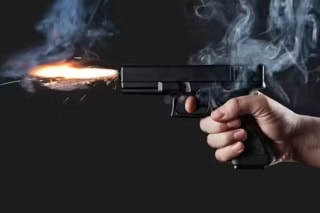 Shot From A Handgun With Fire And Smoke